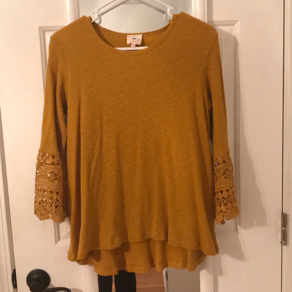 Boutique bell sleeve top.